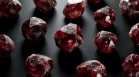 Deep red garnet gemstones scattered on dark surface showing natural crystalline structure and brilliant faceted cuts for jewelry making and luxury design.