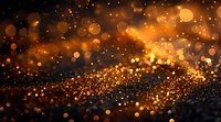 Abstract golden bokeh lights on dark background with glowing particles and sparkles creating magical atmospheric effect. Suitable for festive designs.