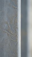 Natural sand patterns and wave formations on pristine beach shore with smooth wet surface textures for coastal and summer vacation designs.