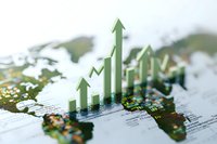Green arrows showing upward trend on world map background with selective focus, representing global economic growth and market recovery statistics.