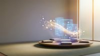 Futuristic holographic display emerging from wooden platform with glowing digital interface and light particles in modern minimalist interior space.