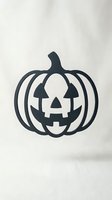 Black jack-o-lantern pumpkin silhouette with carved face on white background isolated for Halloween decorations and seasonal design projects.