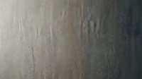 Weathered concrete wall with natural stains and aging patterns showing industrial urban decay texture for architectural backgrounds and design projects.