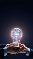 Hands of male professional holding glowing light bulb with brain and atom symbols inside, representing innovation, artificial intelligence, and creative thinking for business solutions.