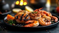 Grilled seafood platter with juicy scallops, succulent shrimp, and fresh herbs on dark plate with citrus garnish. Perfect for gourmet restaurant menu photography.