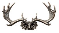 Decorative deer antlers mounted on ornate leaf base, creating rustic wall decor for hunting lodge, cabin, or woodland-themed interior design.