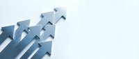 Blue arrows pointing upward symbolizing growth, success, and progress in business strategy and financial performance on white background.