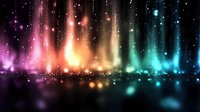 Magical aurora lights with colorful glowing particles and light beams in rainbow colors creating dreamy atmospheric background effect for creative designs.