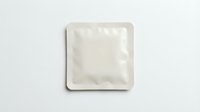 Blank white square ceramic plate on light background for food presentation and culinary photography projects.