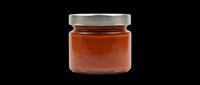 Amber glass jar with metal lid containing red sauce or jam, isolated on transparent background. Ready for packaging design, product mockups, food labels, e-commerce, print-on-demand, and culinary graphics.