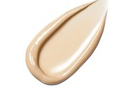 Smooth beige foundation cream smear isolated on white background, cosmetic liquid texture showing silky consistency and natural skin tone shade.