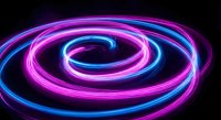 Vibrant neon spiral rings in electric blue and magenta creating dynamic swirling motion against black background for modern digital design projects.