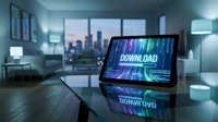 Tablet on glass table displaying glowing download screen with digital data stream, modern living room and city skyline in background at night.