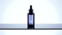 Purple serum bottle with dropper on white background. Skincare cosmetic product for beauty routine and anti-aging treatment. Isolated for design use.