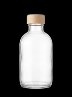 Clear glass bottle with wooden cork lid, isolated on transparent background. Ready for t-shirt design, stickers, clipart, print on demand, and sublimation projects.