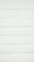 White wooden planks background with horizontal boards and natural grain texture for rustic interior design and home decor projects.
