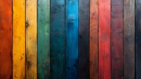 Colorful wooden planks in rainbow spectrum arrangement showing natural wood grain texture and weathered surface with rustic vintage character. Background for design.