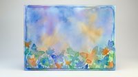 Watercolor painting with colorful butterflies and flowers on a soft blue and yellow gradient background, framed with a light border.