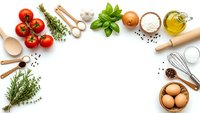 Fresh cooking ingredients and kitchen utensils arranged on white background with copy space for culinary recipes and food preparation concepts.
