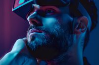 Close up portrait of bearded man in neon lighting with dramatic blue and purple color scheme creating moody cyberpunk atmosphere for creative projects.