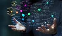 Business professional hands presenting colorful digital network connections and data flow diagrams for technology presentations and corporate communications.