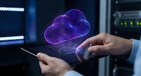 Businessman using tablet with holographic cloud computing technology in modern data center server room for digital transformation and storage.