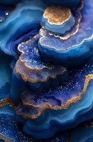 Abstract navy blue and gold geode art with flowing layers, glitter texture and metallic accents creates luxurious marble effect for elegant design projects.