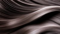 Flowing brown hair strands with smooth silky texture creating elegant waves and curves for beauty and haircare concepts.