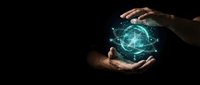 Hands holding glowing digital sphere with blue energy particles on dark background, representing technology, innovation, and future concepts for business and science applications.