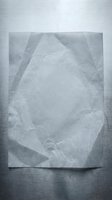 Gray textured paper poster mockup on concrete wall background for branding and advertising design presentations.