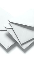 Stack of white blank envelopes on white background, isolated for mail, correspondence, invitation, and business communication concepts.