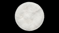 Round white cotton pad isolated on transparent background, ready for beauty, skincare, and cosmetic design use. Great for stickers, clipart, and print on demand projects.