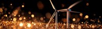 Wind turbine silhouette against dark sky with golden bokeh lights creating magical atmosphere. Sustainable energy concept.