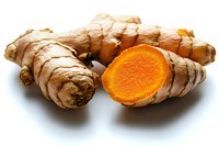Fresh turmeric root with one piece cut to show bright orange flesh isolated on white background, raw organic spice ingredient for cooking and wellness.