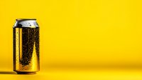 Cold aluminum beverage can with water drops on bright yellow background. Minimalist product photography with copy space for advertising and branding.