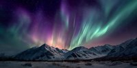 Spectacular aurora borealis dancing across starry night sky above snow-covered mountain peaks in winter landscape with vibrant green and purple lights.