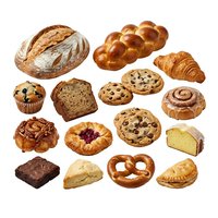 Assorted fresh baked goods including bread, croissants, muffins, cookies and pastries isolated on white background for bakery, cafe and food design projects.