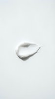 White cream or lotion sample smear on isolated background, ready for skincare, cosmetics, and beauty product design applications.