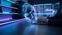 Hands interacting with holographic digital interface displaying rotating smartphone and data visualization in futuristic tech environment for app development and innovation concepts.
