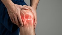 Man holding knee with highlighted bone structure showing joint pain and arthritis symptoms for medical healthcare concept.