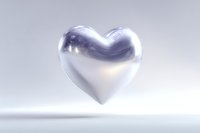 Metallic silver heart floating in white space with soft shadows and reflective surface creates romantic minimalist composition for Valentine's Day designs.