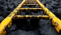 Yellow ladder rungs emerging from dark asphalt surface with selective focus, creating dramatic perspective and industrial mood for construction and safety concepts.