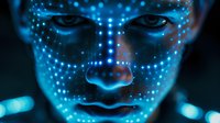 Caucasian face illuminated by blue digital mapping points, showing biometric facial recognition technology against dark background for security concept.