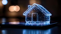 Digital holographic house projection on smartphone screen with glowing blue particles and bokeh lights background for real estate technology concepts.