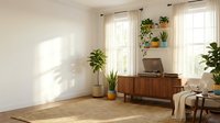 Modern minimalist home office with wooden desk, laptop, and lush green plants creating productive workspace atmosphere for remote work and productivity.