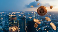 Golden cryptocurrency coins floating over blurred cityscape at sunset, digital finance concept with bokeh lights and modern urban background.