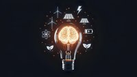 Glowing light bulb with brain filament surrounded by renewable energy icons on dark background for innovation and sustainability concepts.