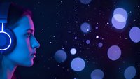 Young woman with headphones in profile against starry night sky with glowing bokeh lights, neon blue and purple lighting creating futuristic atmosphere.