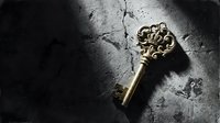 Antique golden skeleton key with ornate crown detail resting on dark cracked stone surface, dramatic moody lighting casting deep shadows.