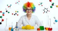Young Caucasian female scientist with colorful rainbow afro wig and glasses in white lab coat at chemistry laboratory table with beakers and molecular models.